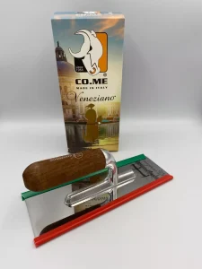CO.ME Veneziano Decoration Trowel in box 240x100x0.6mm double bevelled edges, aluminium and wood handle. A professional and unique CO.ME Veneziano Venetian plastering trowel with double bevelled stainless steel edges. Both durable and flexible.